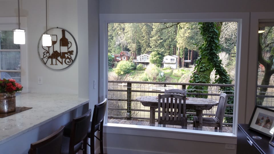 Big deck off kitchen & great room. Expandable teak table that easily seats six.