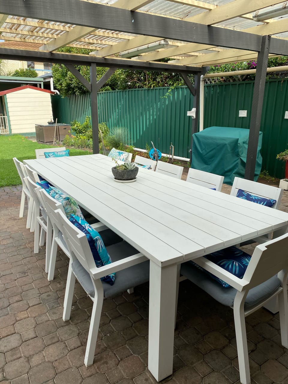 A large Outdoor entertaining area with BBQ