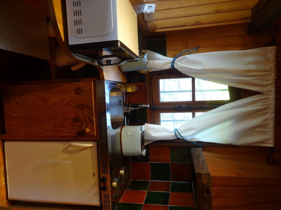 Studio kitchenette with fridge, hobs microwave, kettle and toaster