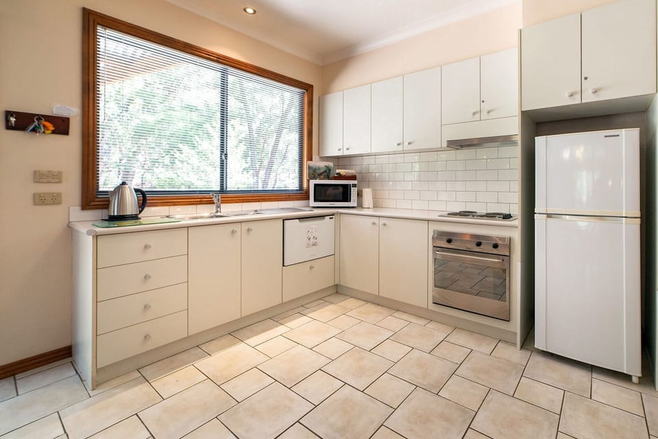 Kitchen elegance: A culinary haven blending style and functionality seamlessly.
