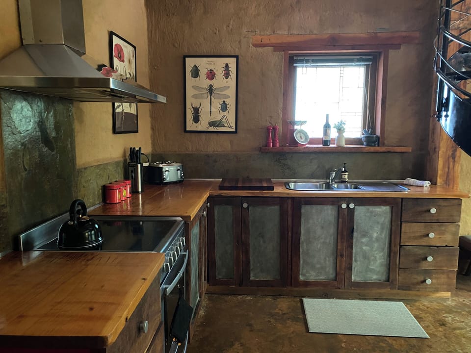 kitchen area with full fridge and microwave (not shown)
