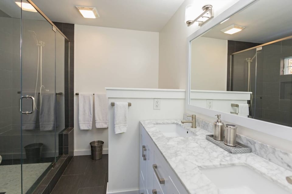 Renovated bathroom. Dual sinks.