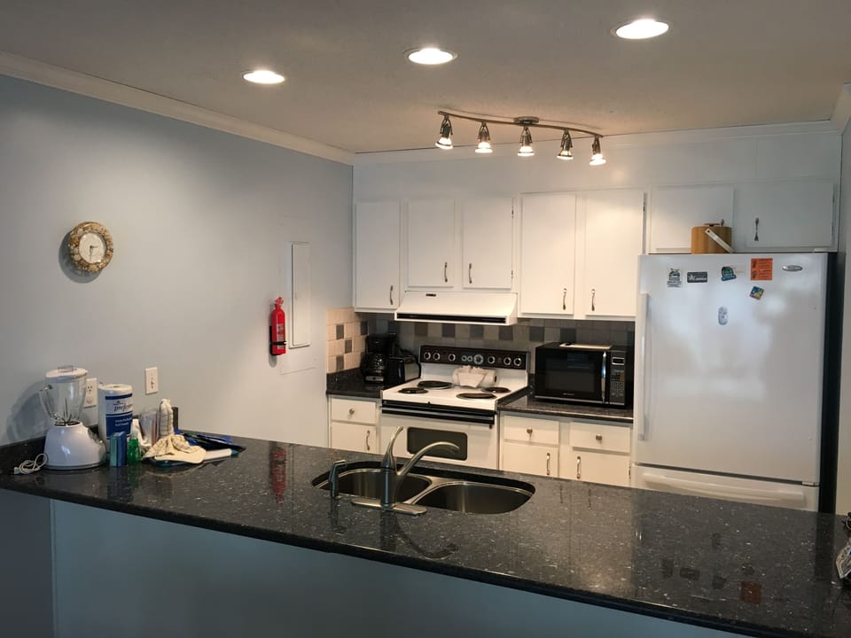 Fully equipped kitchen with granite counter tops