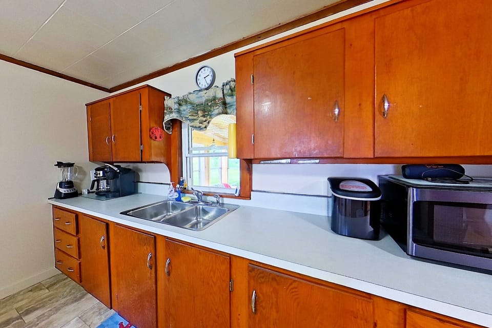 Blender, coffeemaker, Keurig, ice maker, Microwave, in our fully stocked kitchen