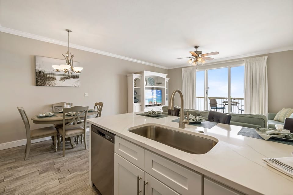 New quartz counter tops with new kitchen cabinets.