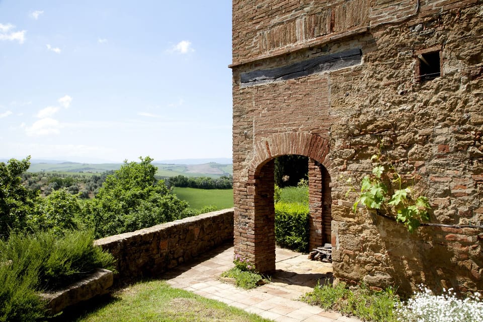 Turn the corner to the front of the house, original wood burning oven in corner 