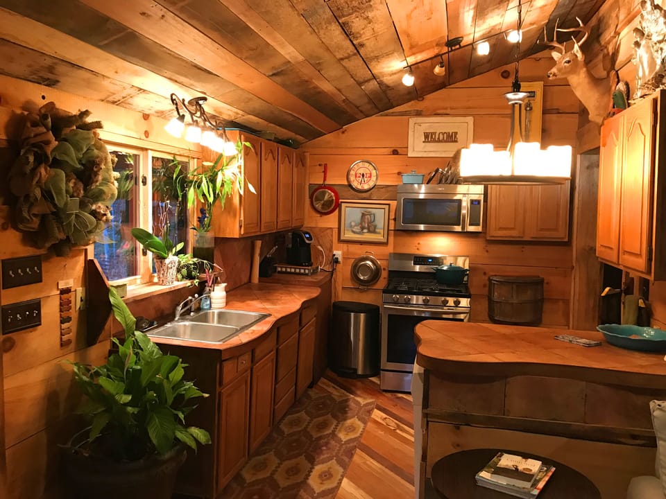 kitchen with stainless steel appliances and gas stove.