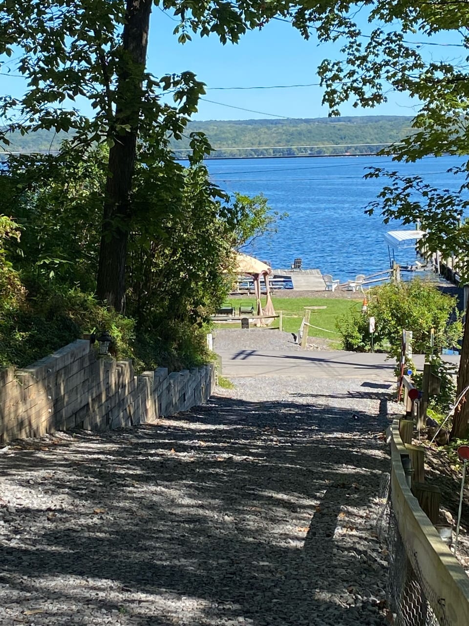 View from top of driveway, beach is across the road