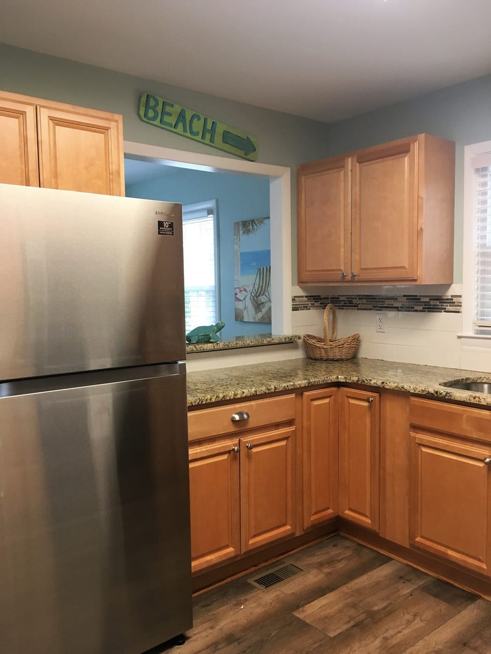 Kitchen is fully stocked with cooking utensils to create wonderful family meals.