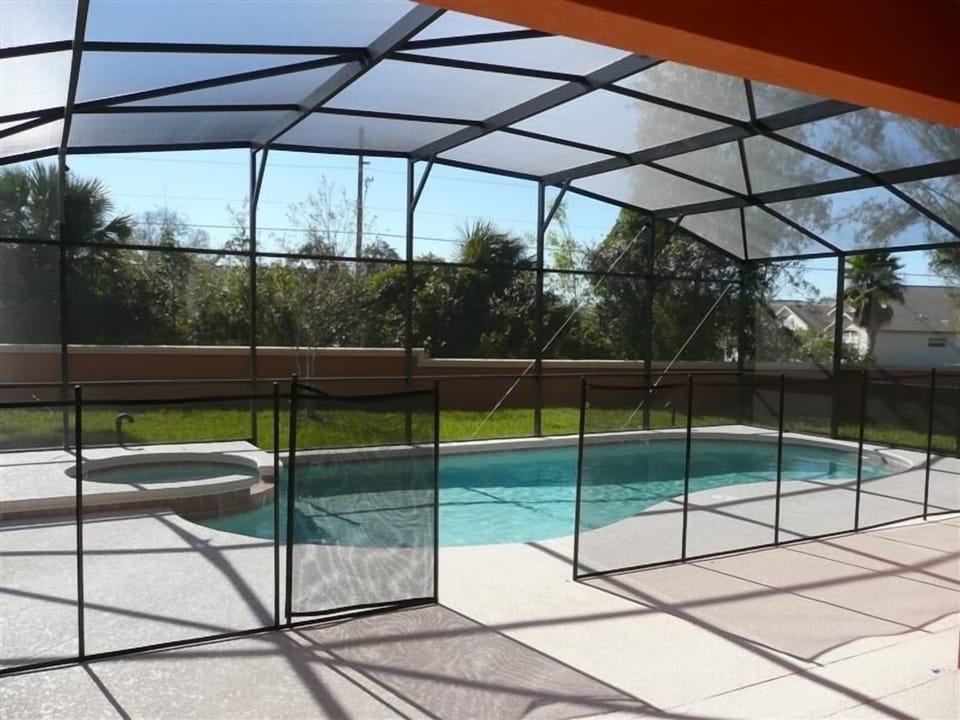 Pool with extended deck area and Lanai
