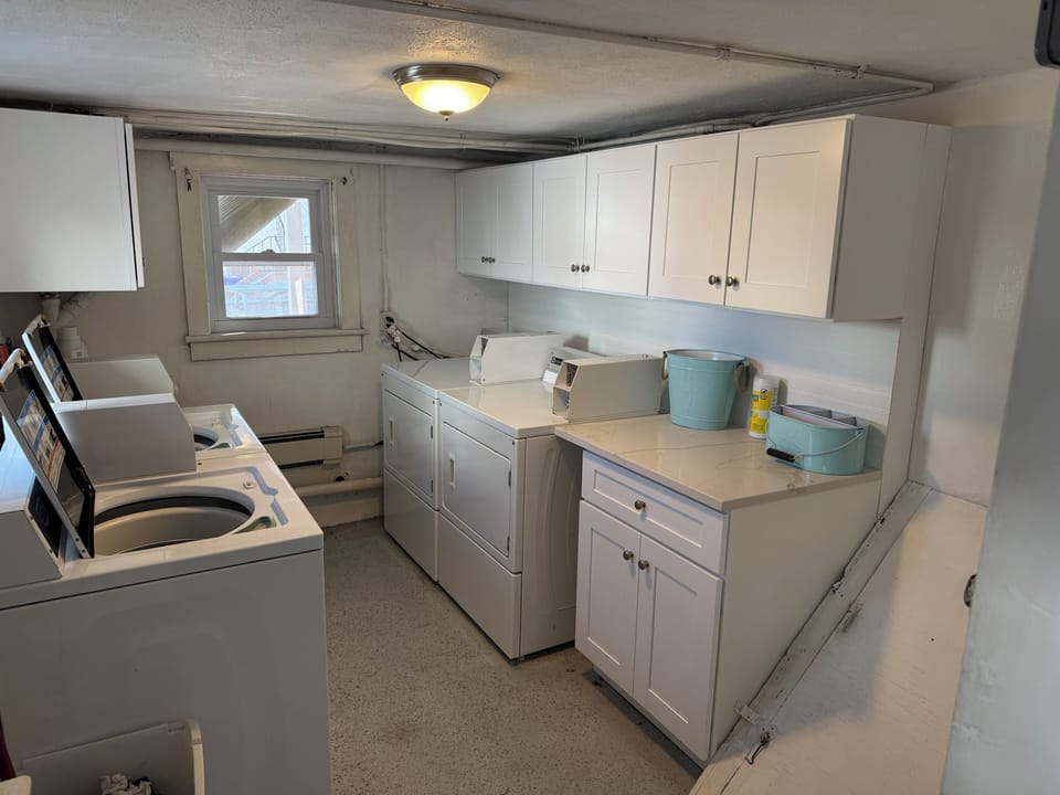 Common Laundry Room with coin operated washers and dryers.