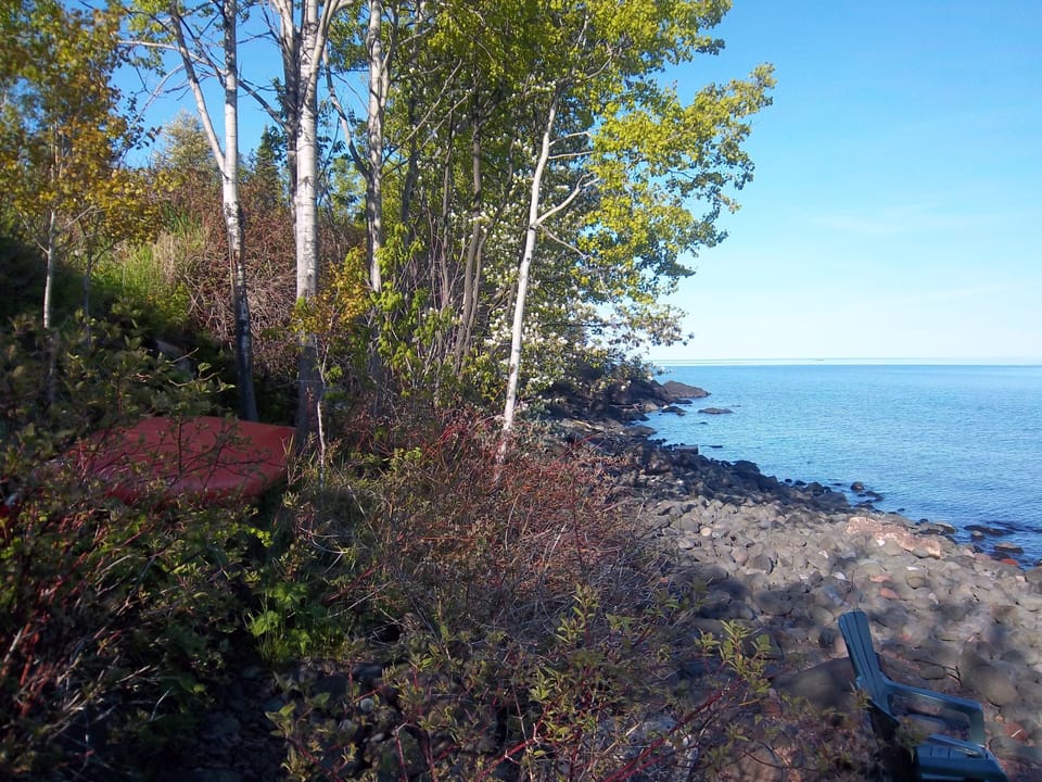Shoreline Looking East
The summer blue waters of Lake Superior as you look to the east on the Croftville Road Cottages beach.