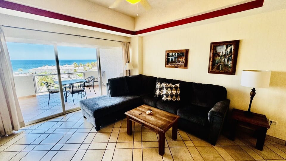 View of the water from the living room.Brand new sofa with Queen size memory foam mattress,and no back bar! The most comfortabe sleeper ever made.