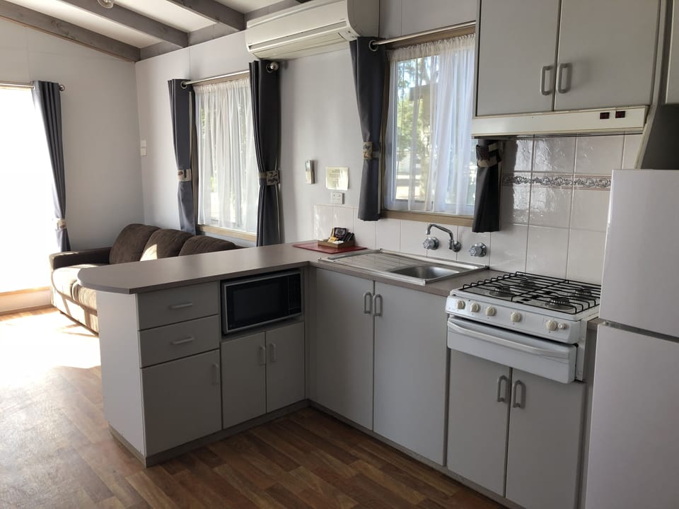 Family Cabin | Private kitchen | Full-size fridge, microwave, stovetop, electric kettle