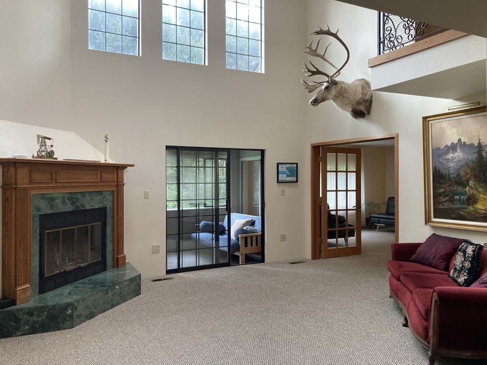 Entry leads to porch and living room