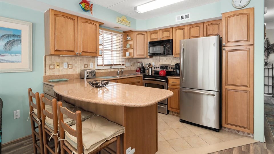 Updated Kitchen Stainless and Solid surface counters