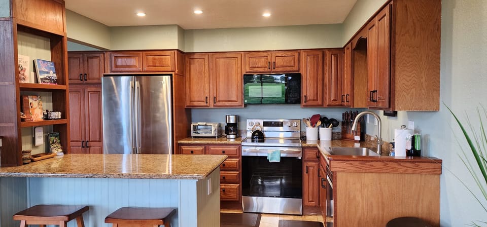 Puamana 14A Open, well equipped kitchen - This is a pleasure to cook in while enjoying family and friends.