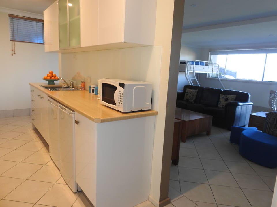 Full kitchen with oven, stove and all cooking utensils. 