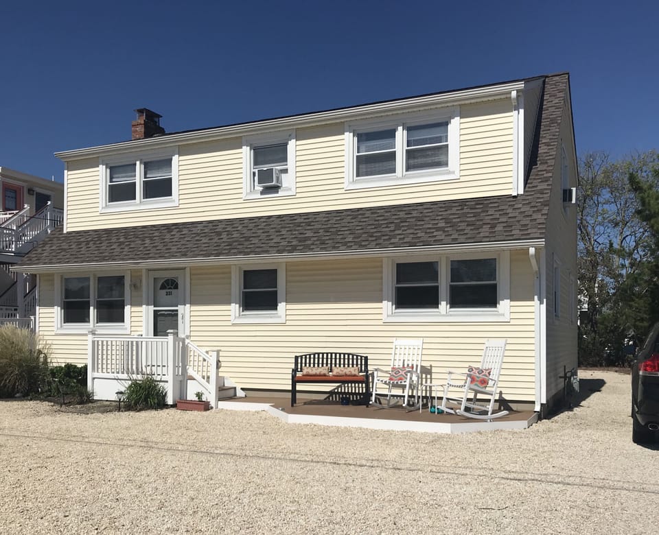 Front of house. First floor unit of duplex. 