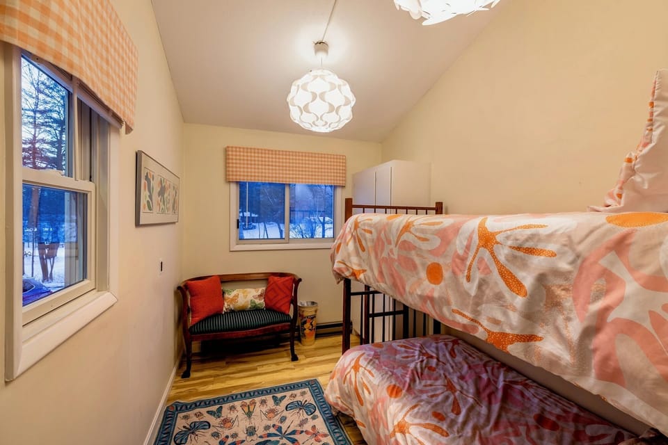 bunk beds on the ground fl. Uses the bathroom upstairs in the hall. 
