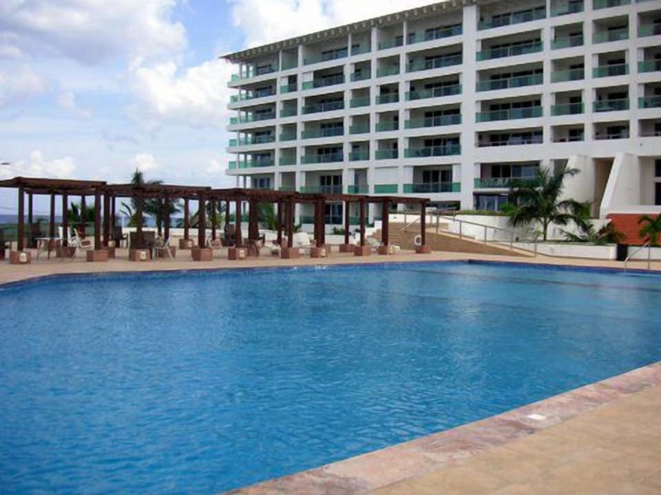 Cabanas, plenty of lounge chairs and Bali beds 