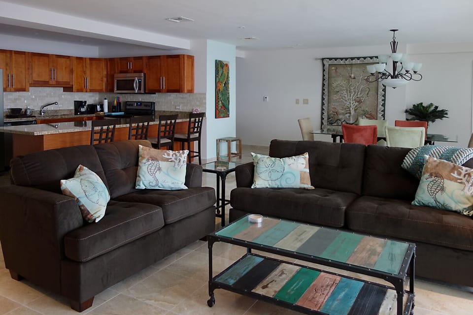Huge living space with an open floor plan, beautifully decorated