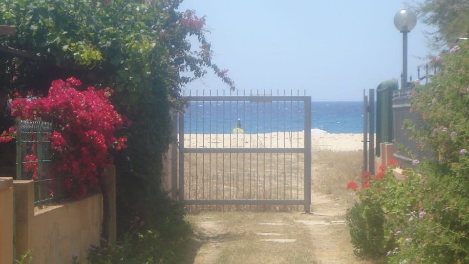 The property features private beach lane access to Solanas beach.