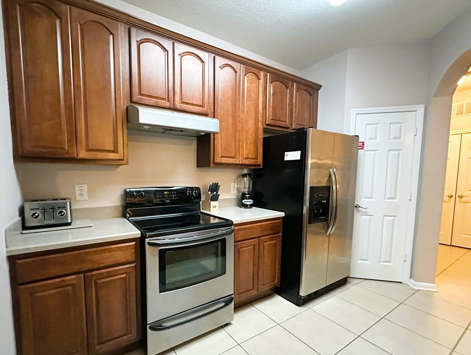 Fully equipped kitchen with stainless steel appliances
