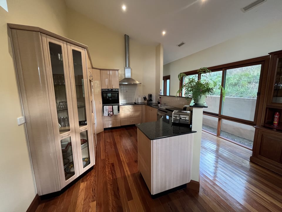 Fully stocked kitchen with a new oven and cooktop