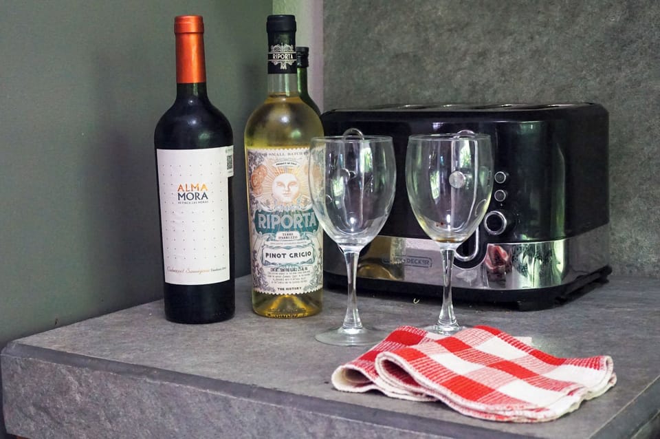 Enjoy a glass of local wine after a day in the sun.