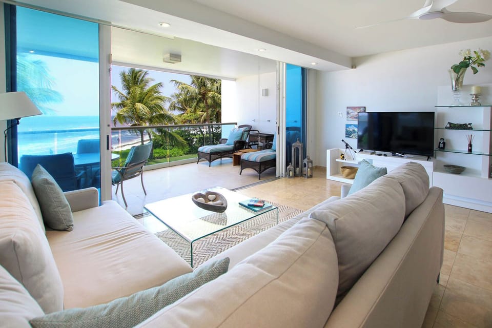 Open plan living area has a comfortable L-shaped couch, wifi, apple TV, DVD player and stereo