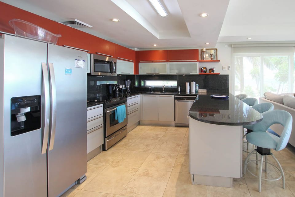 The fully outfitted kitchen has all you'll need while on vacation including a microwave, dishwasher, and more