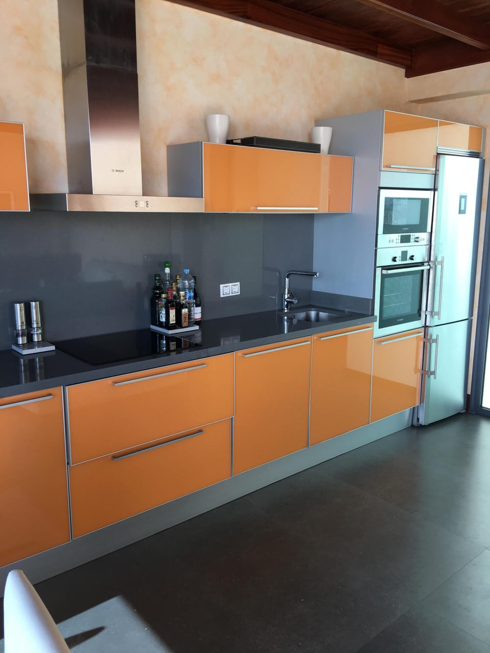 The kitchen features top of the range appliances.