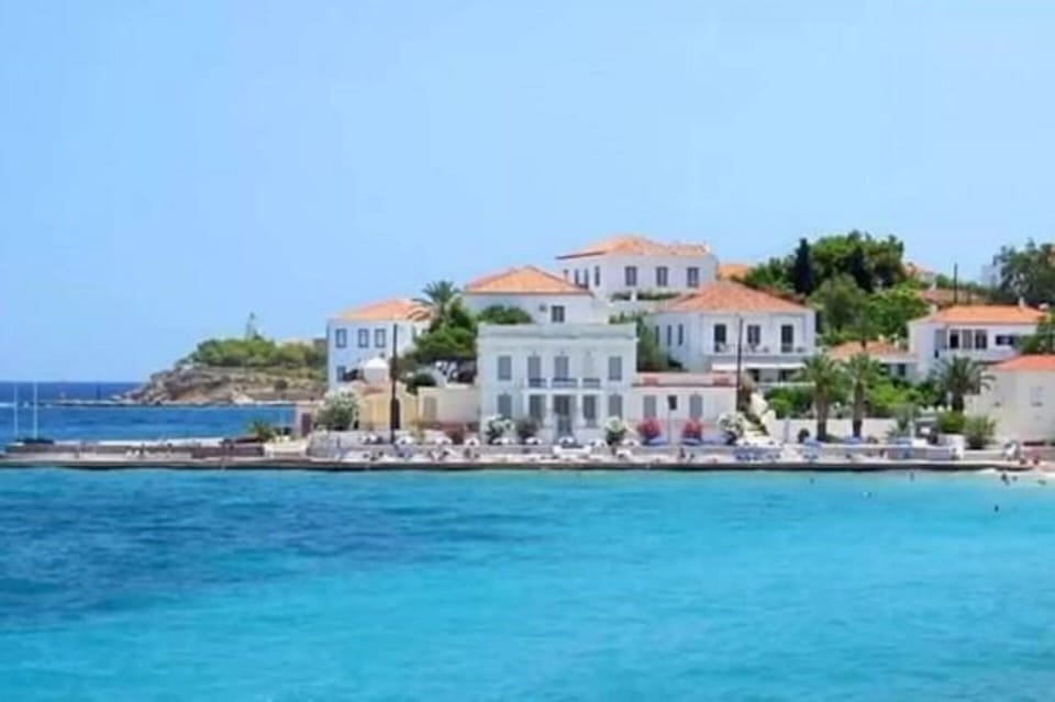 AERIAL VIEW OF THE HOUSE IN AGIOS MAMAS – IT IS FOR THE HOUSE WITH CERAMIDES AND