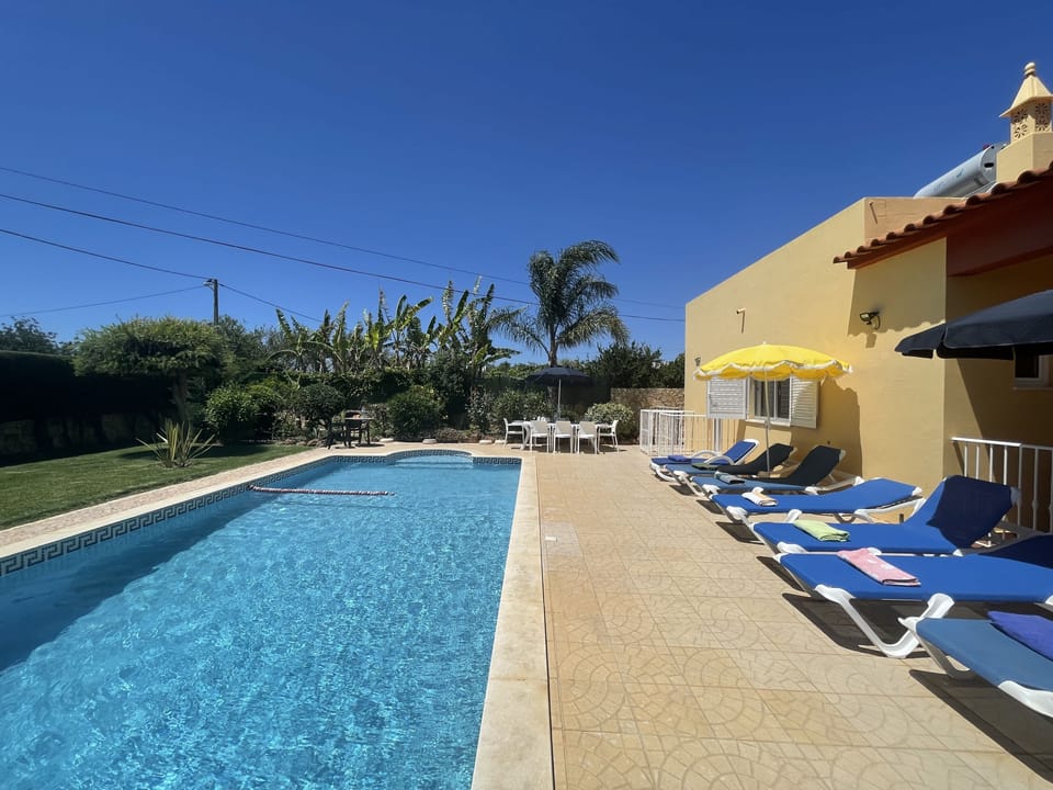 Large pool terrace areas with a large 8.5m x 5m pool with depths from 0.80m to 1.9 m.