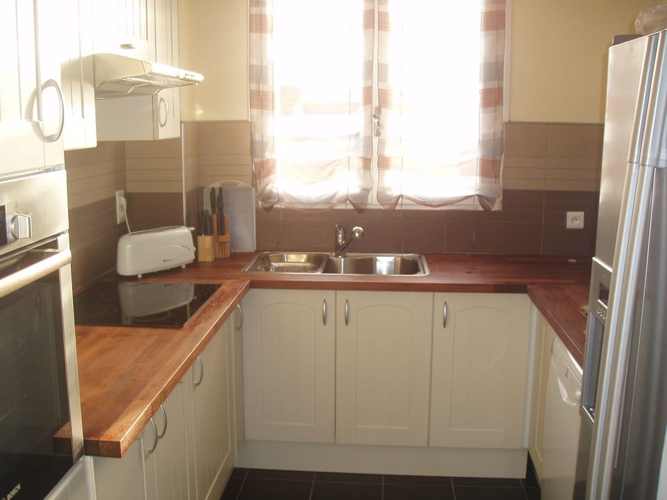 A separate kitchen - first floor