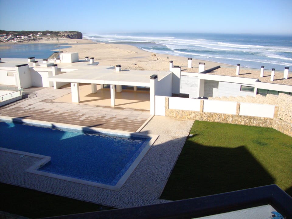 Sea view from standing on balcony where you can have an outside table and chairs