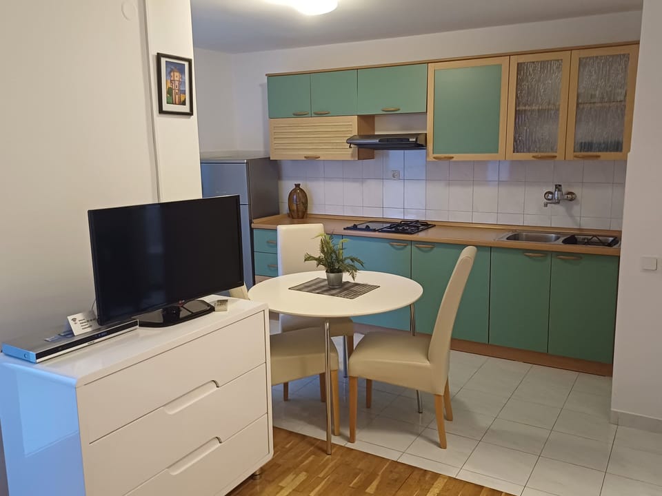 Standard Apartment, 1 Bedroom, Sea View | Private kitchen | Fridge, coffee/tea maker