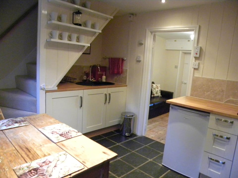The kitchen looking into the lounge