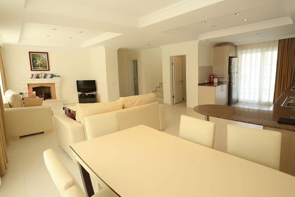 Bright and Airy Lounge Diner with Ornate Fireplace