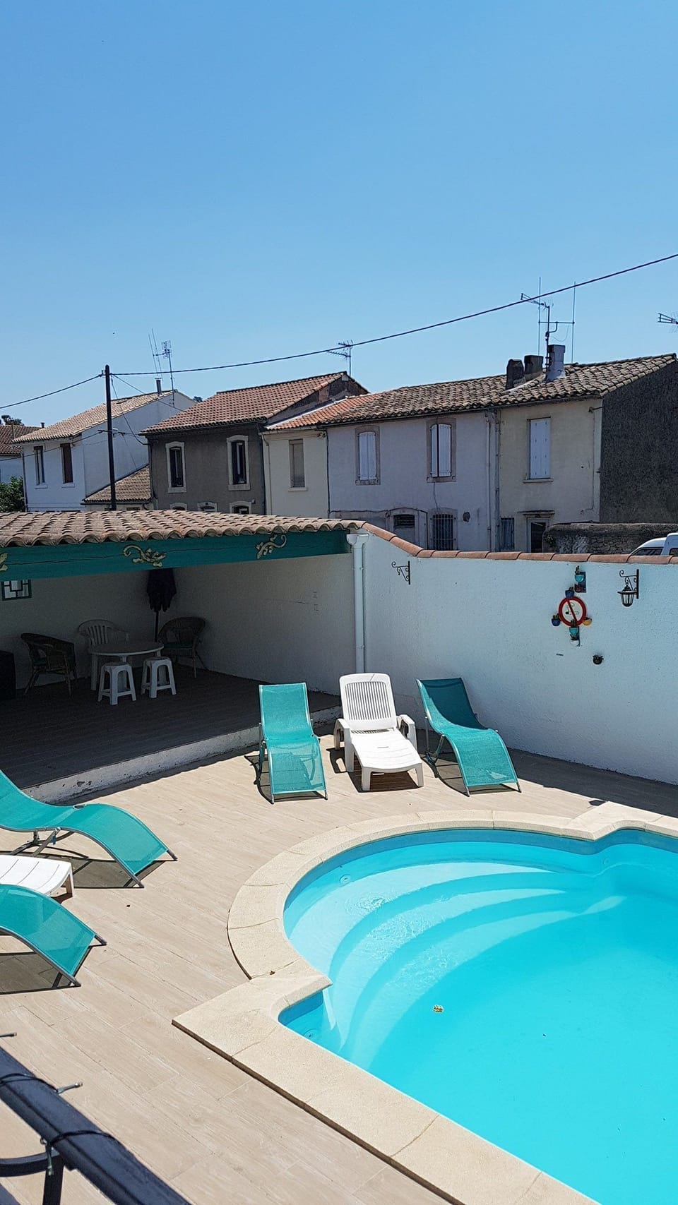 Two bedrooms and the linving/dining room overlook the private pool.