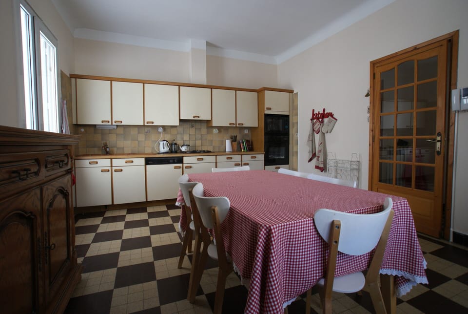 Spacious and bright kitchen overlooking the porch