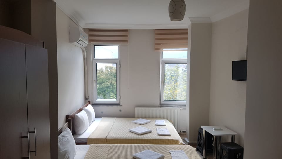 Standard Triple Room | Desk, free WiFi, bed sheets