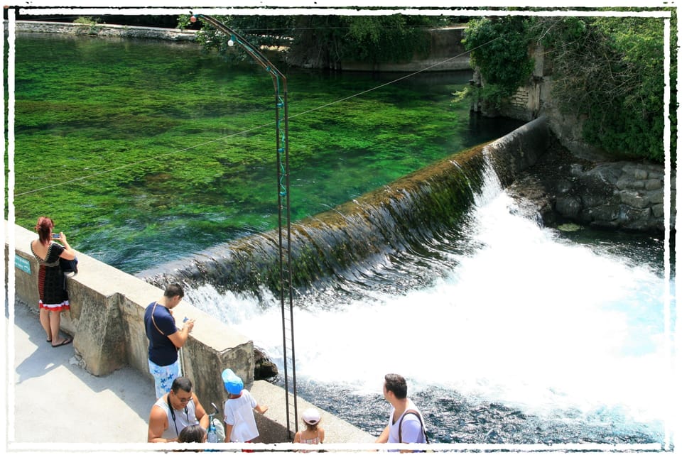 Fontaine de Vaucluse - the source of the Sorgue river flows from the mountain
