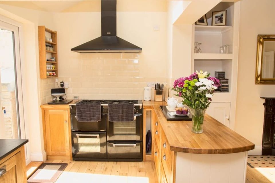 Handmade oak kitchen with range cooker and granite worktops