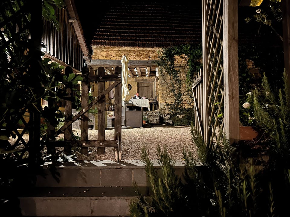 The covered out-door dining area with soft lighting creates a magical place