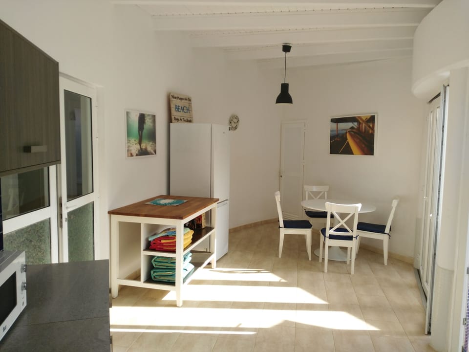 huge kitchen and dining area opens up to terrace 