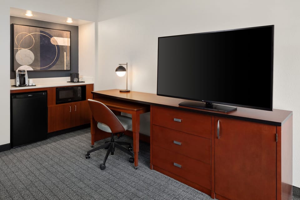 37-inch TV with cable channels, pay movies