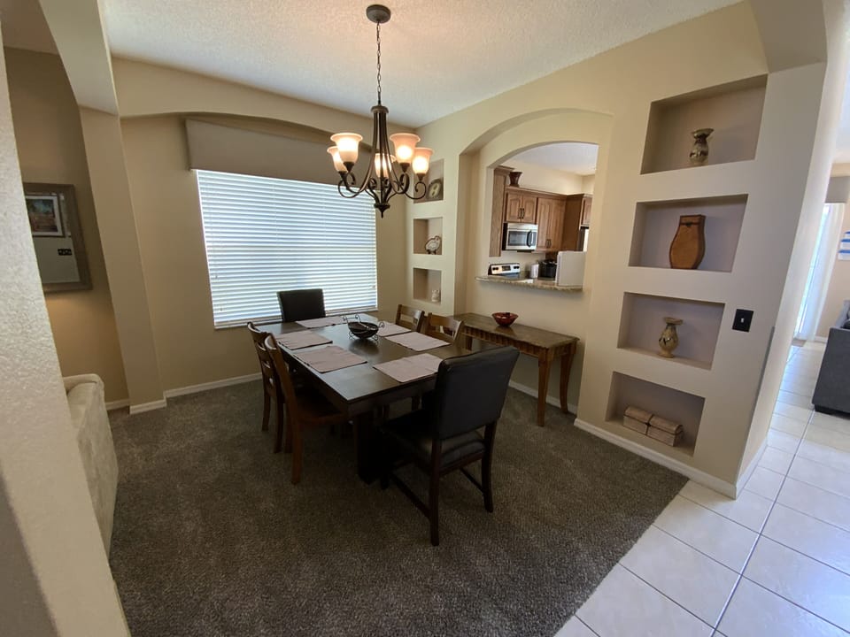 There is a formal dining table for 6