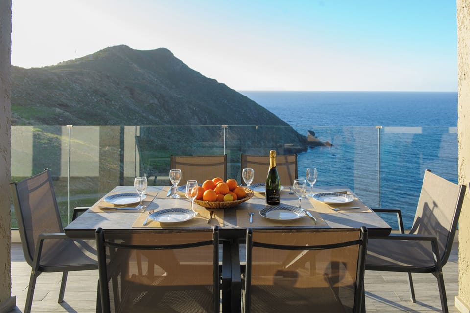 Outdoor dinning area with amazing sea view for 6 guests.